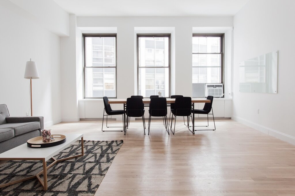 minimalist studio room with single multifunctional furniture piece