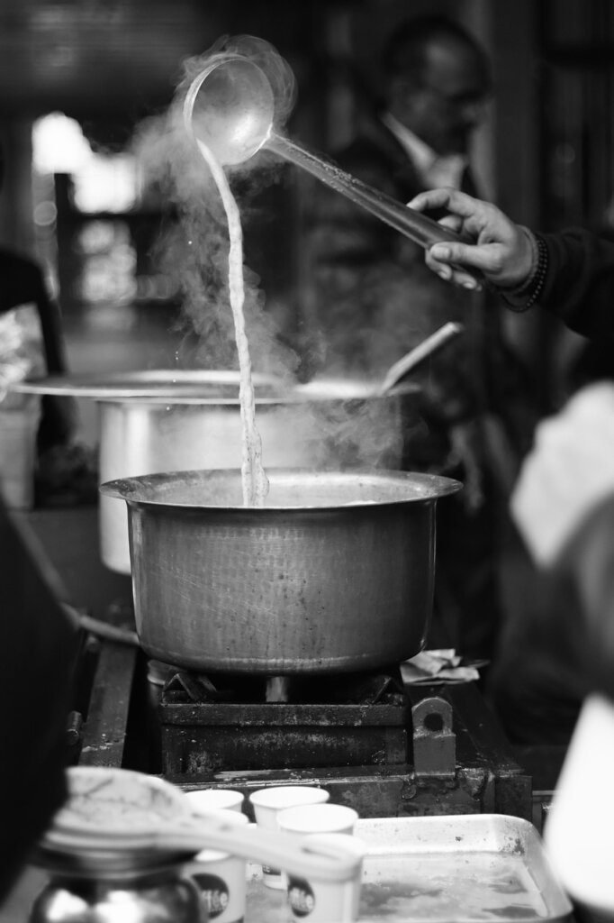 steam rising from cooking pot in modern kitchen