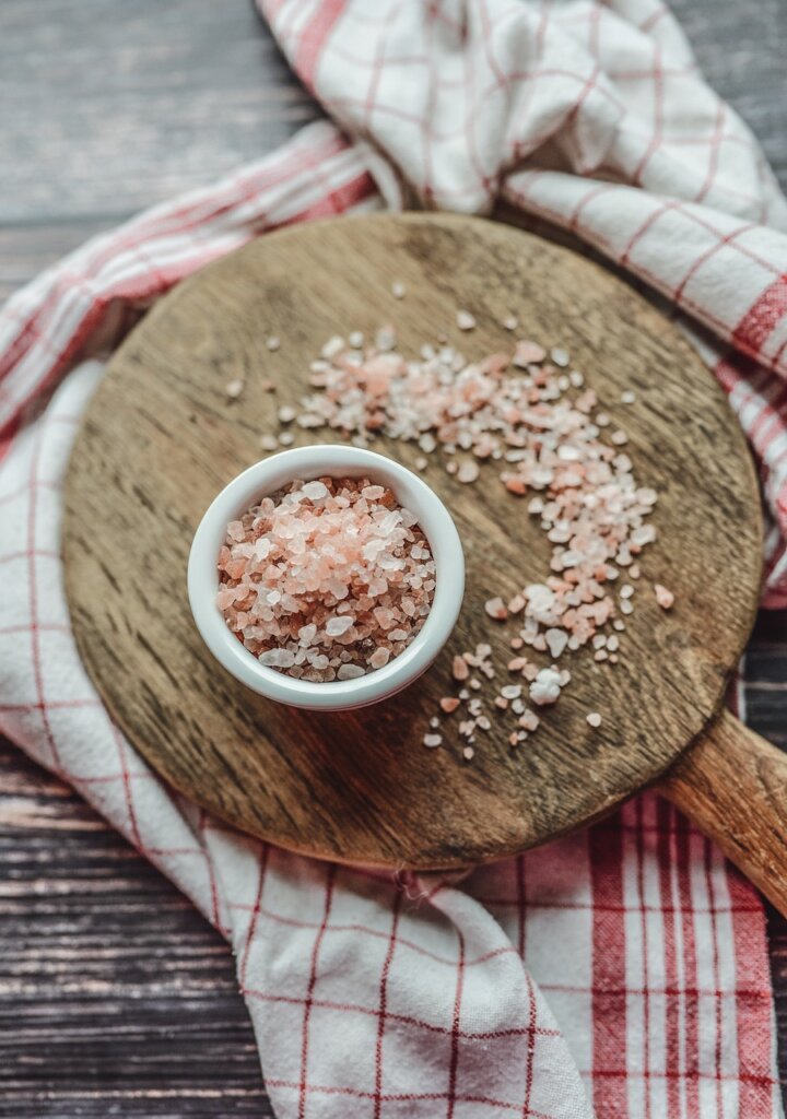 natural ant repellent ingredients spread on wooden table