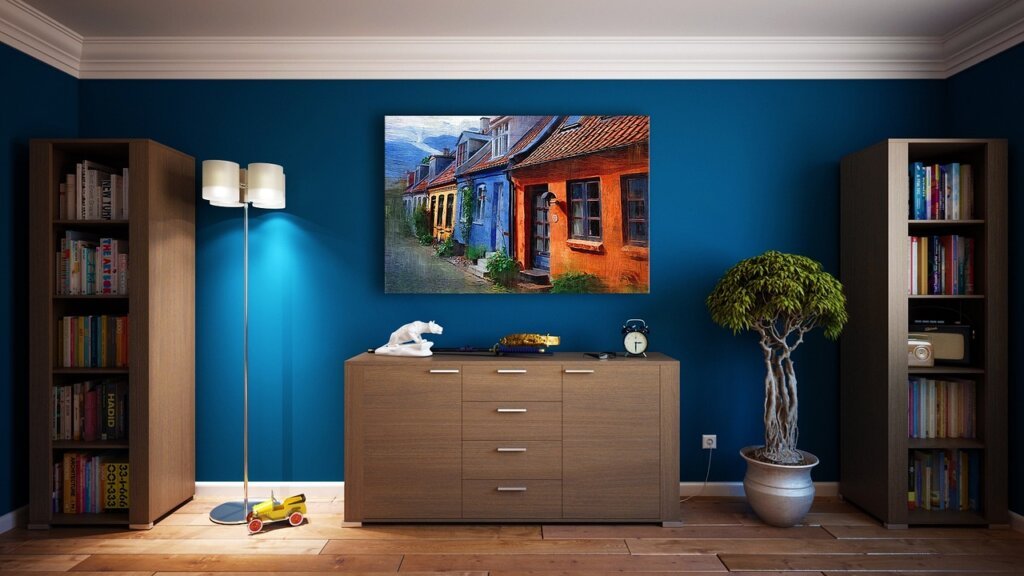 wooden storage cabinet with small gap from wall showing air circulation
