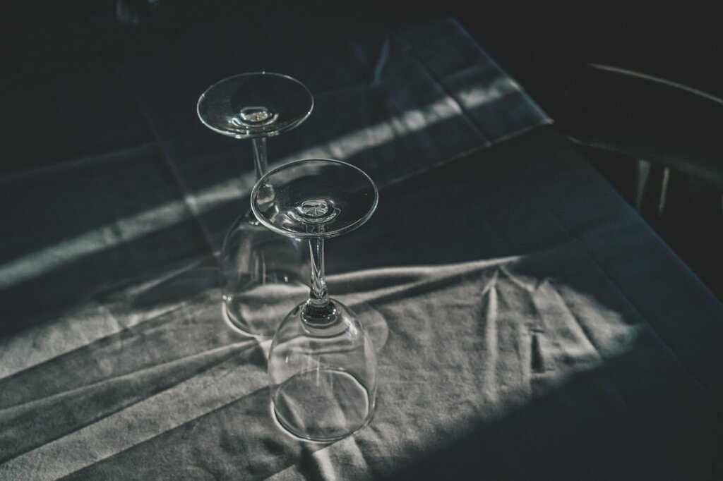 ironing linen curtain at low temperature setting while slightly damp