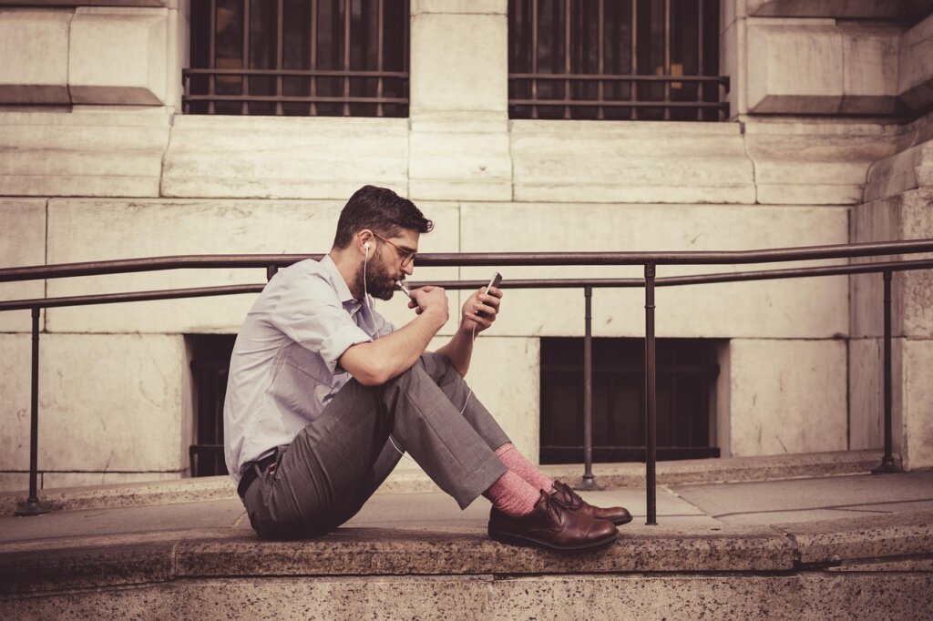 person checking online reviews on smartphone for cleaning service