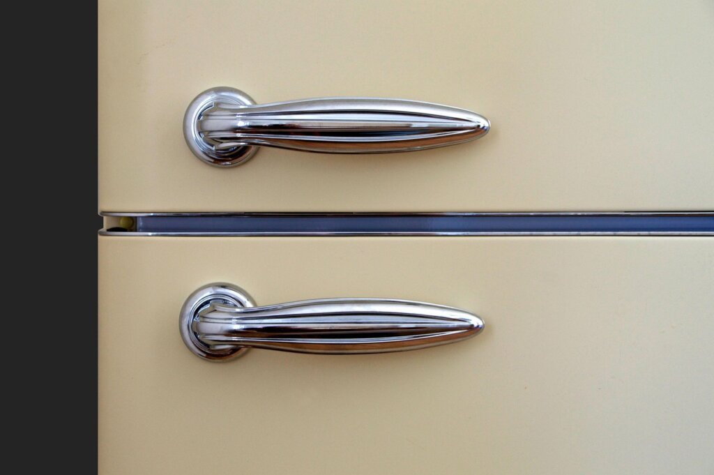 new refrigerator door gasket replacement process with screwdriver