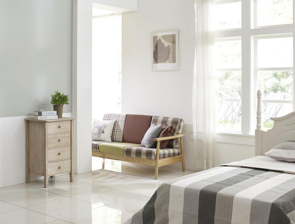 bright Korean living room with open windows and natural light during summer