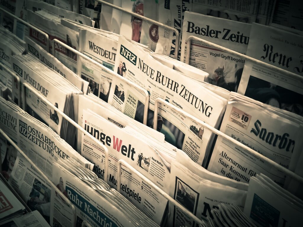 newspaper stuffed inside wet shoes drying naturally