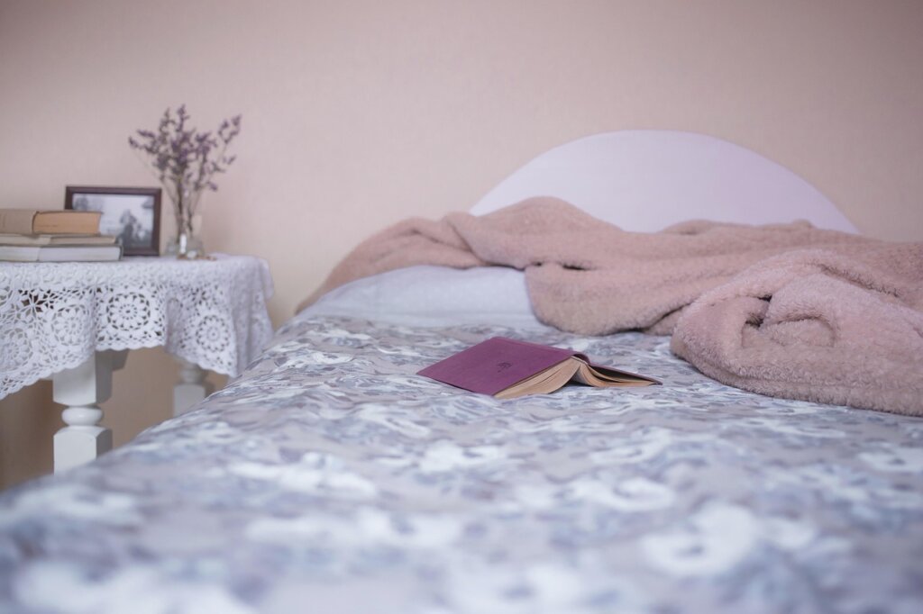white bed sheet with baking soda on laundry room counter