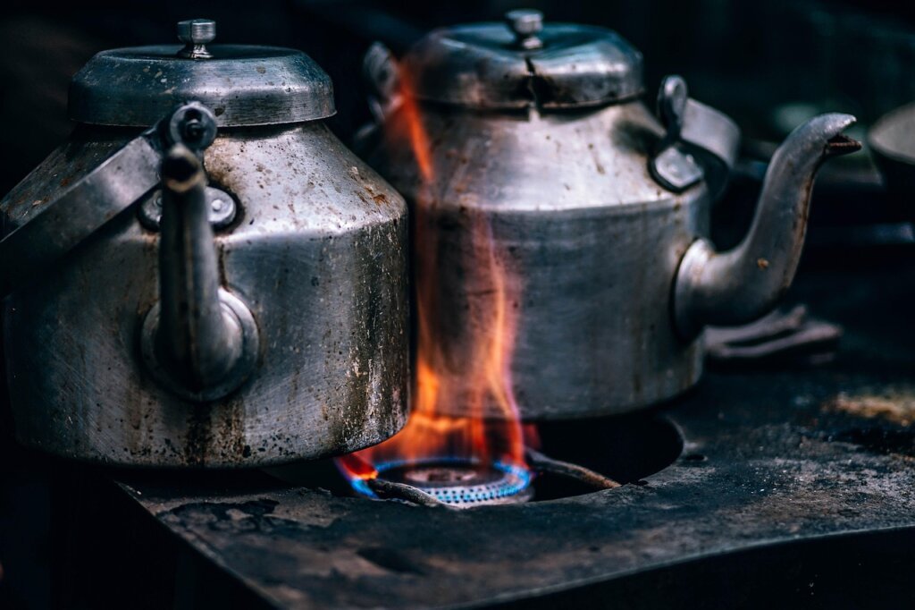 pot boiling dishcloth on gas stove kitchen